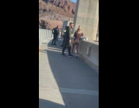 Woman black bikini bonnet water dam pictorial