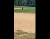 Collab WINY - Man fishing on a grassy field 