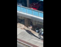 Collab IITW - Woman ate ice cream front of door