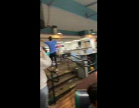 Guy lands a strike with long range throw at bowling alley