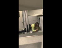 Green shirt black leggings girl sings alone  