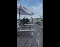 Blue dress girl pier bridge white umbrella 