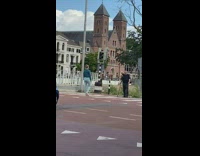 Girl blue sweater block old couple pedestrian