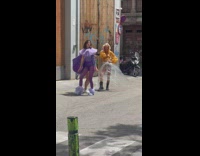 Three women acts for a tiktok at the street