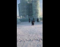Three woman dance ice castle snow china