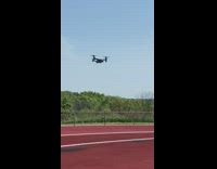 Presidential helicopter passes by the football field