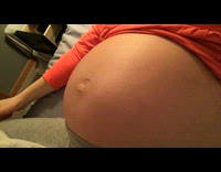 Infant moves inside the womb of mother