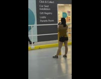 Guy maroon shirt look phone baby bunting