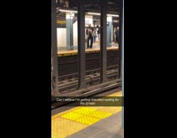 Guy Rick Rolls Across Subway Station 