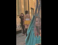 Yellow shorts black boots girl alley hammock 