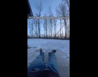 Man wearing boots slips on ice