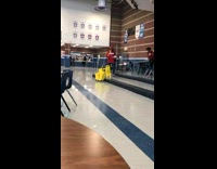 Guy red hoodie pretends to slip on wet floor