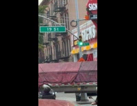 Tractor trailer slams into traffic light pole