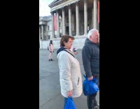 Old couple disappointed watch young girls dance