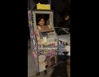 Kid dressed an ATM for Halloween