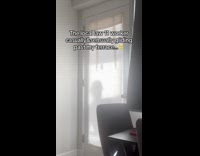 Worker slowly slides down past filmers terrace