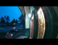 Security cam of guy that trips while carrying things to car