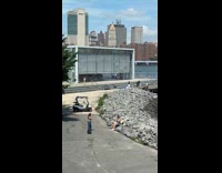 Collab WINY - Woman sit on rocks near crime scene