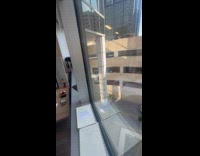 Car hangs on edge of parking lot