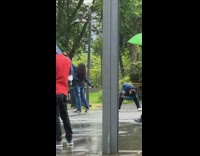 Woman jean jacket spread her arms Nike shoes