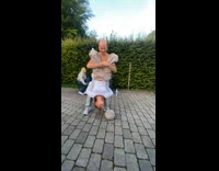 Woman carry other woman upside down outbalanced