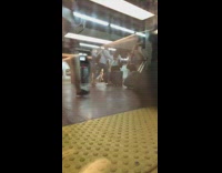 Subway passenger crowd speed walks and run to their next train with luggage and bags