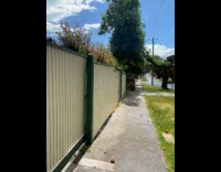 Filmer walk on street raining while sunny