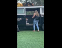 Guy sits black malibu cafe van yeezys 