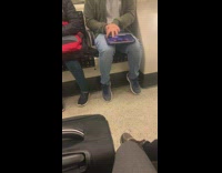 Guy playing game on ipad tapping at high speed