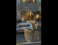 woman white coat storefront picture