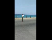 Two men costume dance pedestrian lane beach