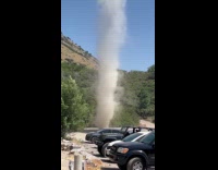Man films cool video of dust devil