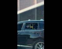 SUV drive on highway speakers on backseat