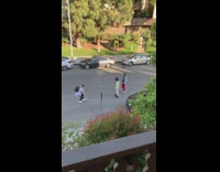 Two guys lock dance street red pants