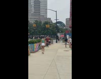 Woman green tank top jump rope at the park