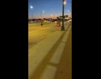 Guy sit middle road lights  motorcycle night 
