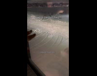 Man shows persons footprint on fresh snowfall 