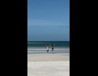 A couple tries to recreate baywatch beach scene 