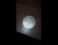 American dollar in a coin on table