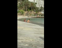 Woman bikini sit beach couple hold hands