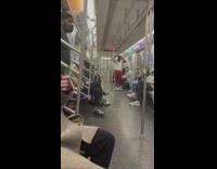 Man red pants swing on train railings