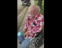 Old man paints car turquoise 