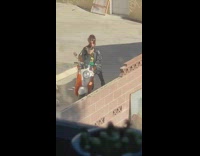 Woman leather jacket motorcycle side mirror selfie