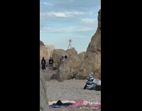 Two women bikini yoga exercise beach rocks Part 1