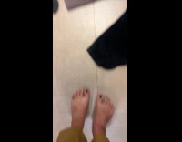 Woman stretches worn pants and produces sound