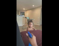 Baby stops crying and laughs at blue spray bottle  