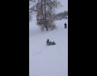 Guy rides sled off ramp, hits chest hard and flies off sled