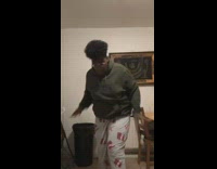 Guy green jacket Marvel pajama does funny dance to hip hop song