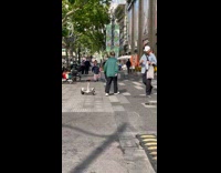 Man Drags Tied Hoverboard with Seat on Sidewalk Part 1