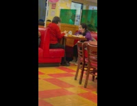 Woman wearing two masks but doesnt cover mouth